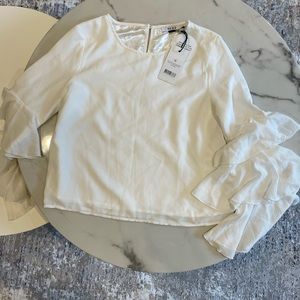 Nakd white blouse with ruffle sleeves. Size medium. NWT